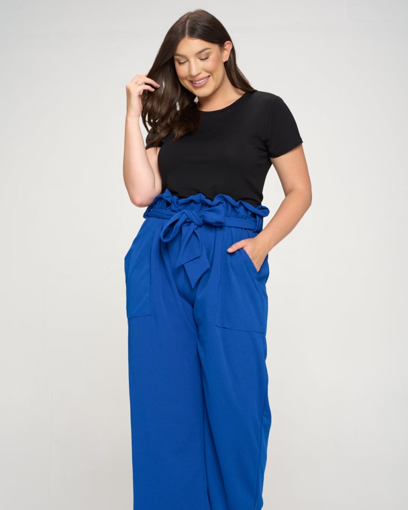 Front of a model wearing a size 1X Kathleen Paperbag Pants in Royal by L I V D. | dia_product_style_image_id:241054